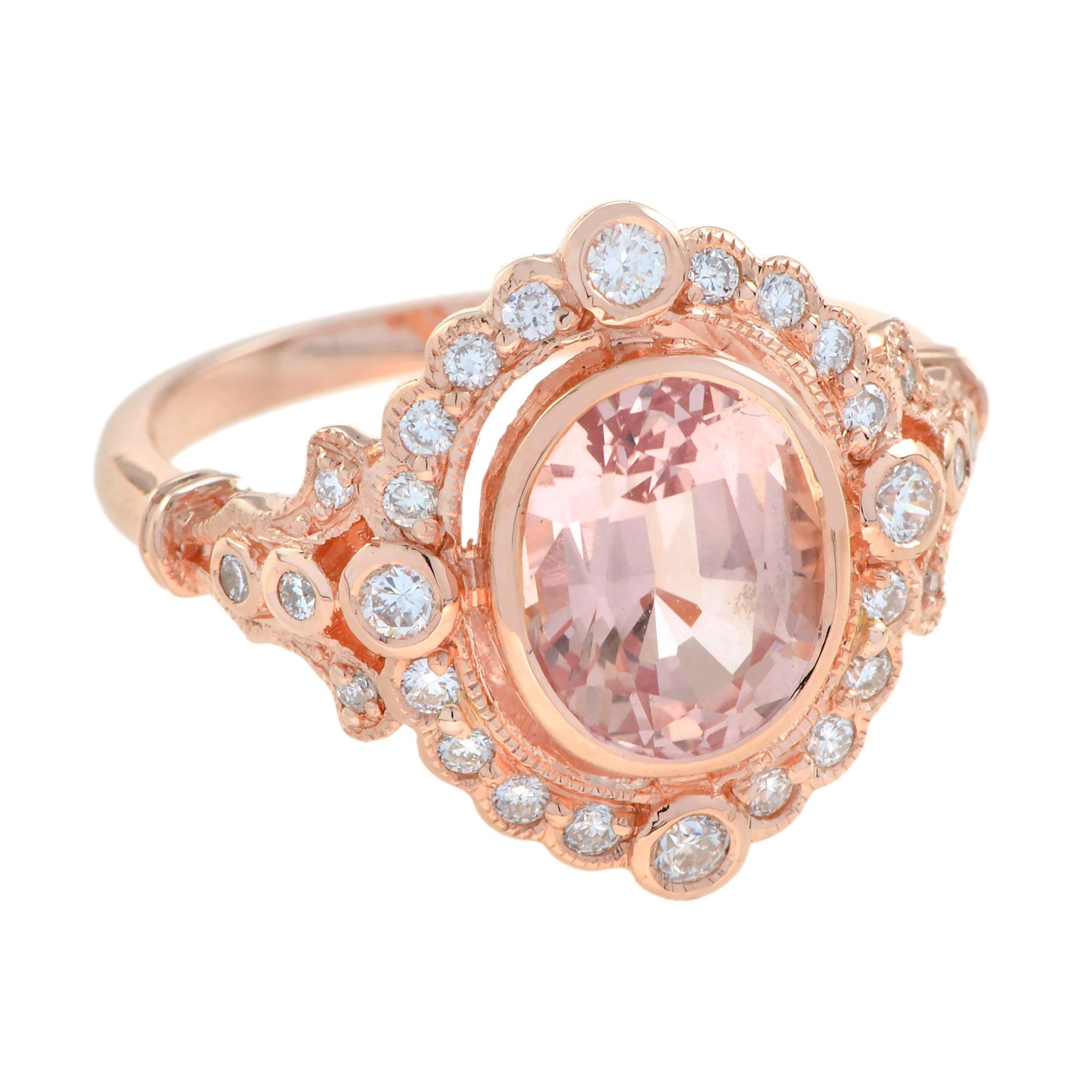 A delightful gold ring features 9×7 mm. oval cut peach color morganite. The center morganite is surrounded by a total of 0.40 carat of diamonds that are H/SI stones. The pink tone of the morganite compliments the rose gold perfectly. What a sweet