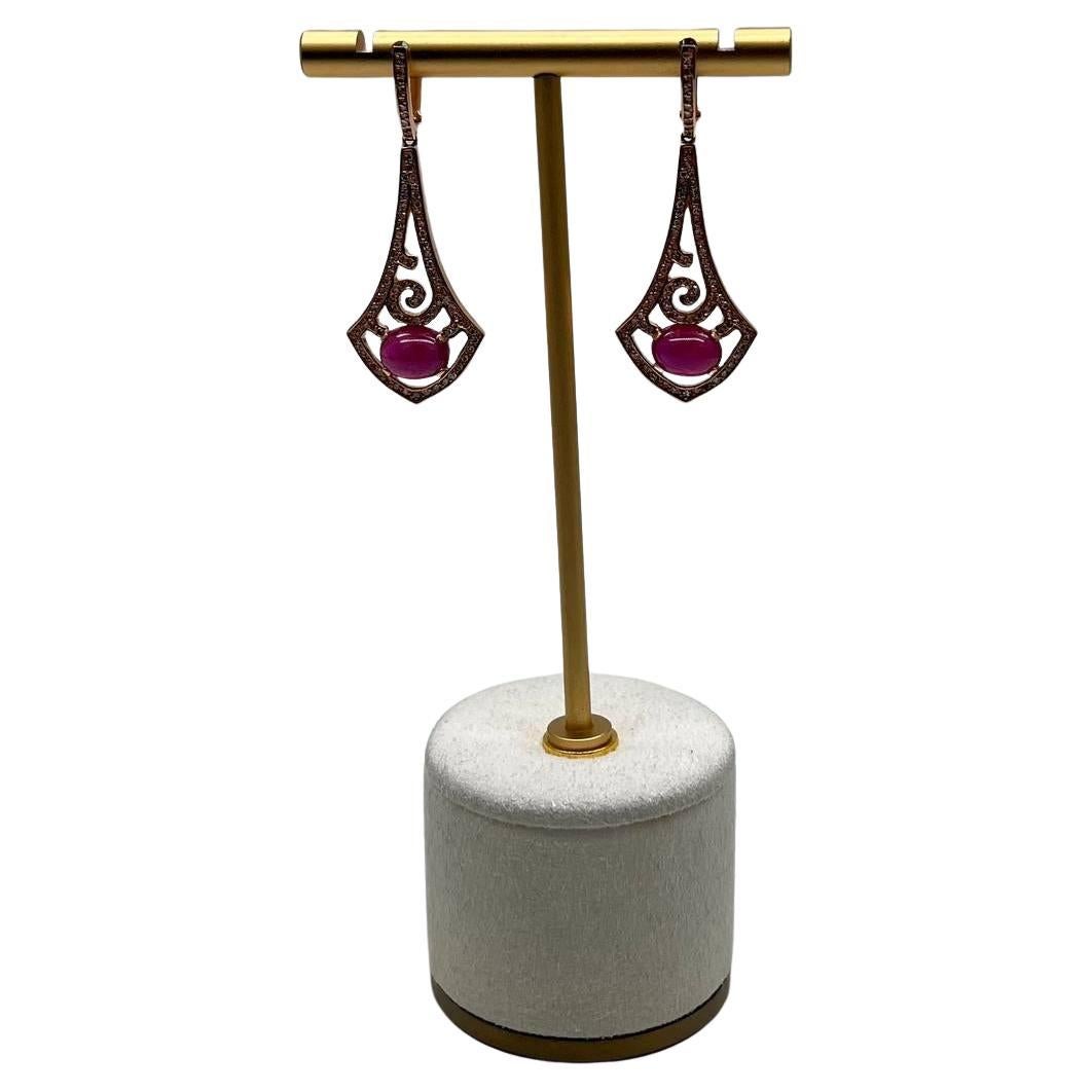 Pendientes de oro blanco de 14 quilates con cabujón ovalado de rubí rosa rojo