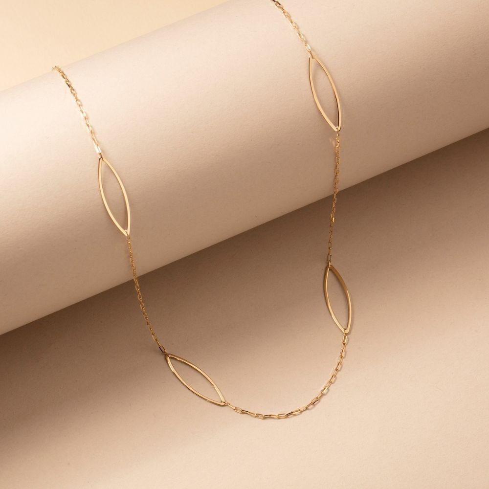 Experience the delicate allure of the 14K Gold Station Necklace by ORENA Jewelry. Expertly handcrafted, this necklace exemplifies understated luxury, offering the perfect balance of elegance and versatility. Wear it alone for a touch of minimalist