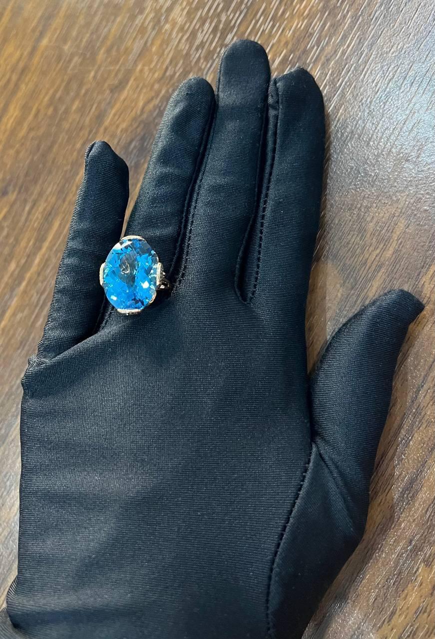 Oval Shape Swiss Blue Topaz 14K Rose Gold Champagne Halo Cocktail Ring For Sale 3