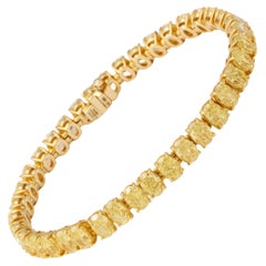 Bracciale con diamanti gialli di forma ovale