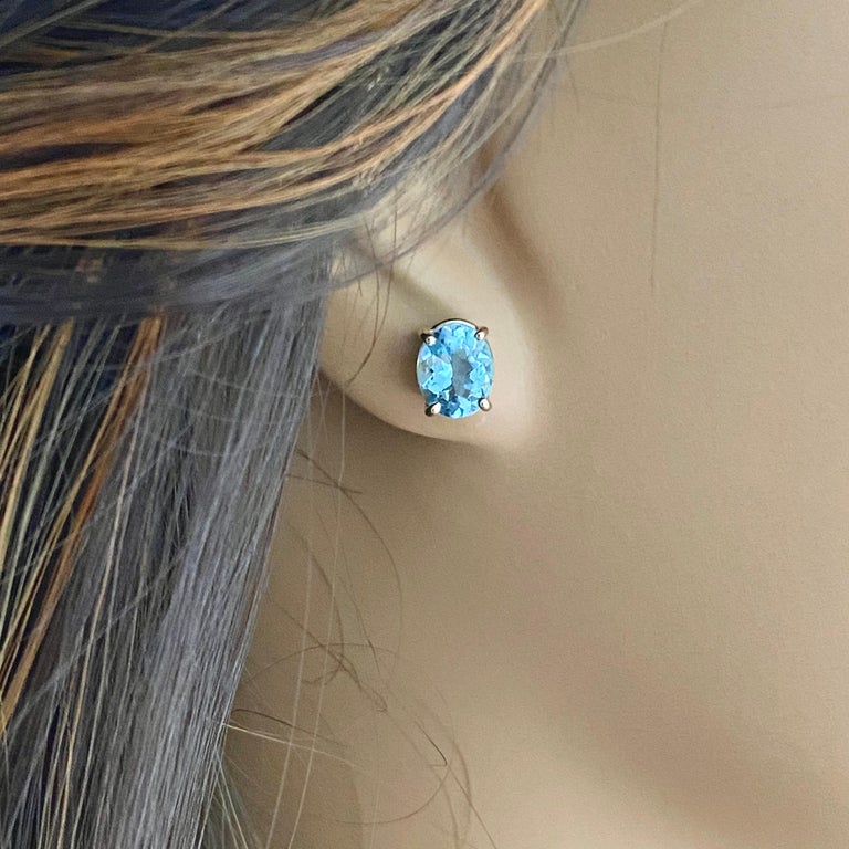 Oval Shaped Aquamarine Set in Yellow Gold Stud Earrings For Sale 9