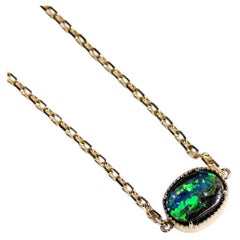Oval Shaped Australian Boulder Opal Bracelet in 14K Yellow Gold