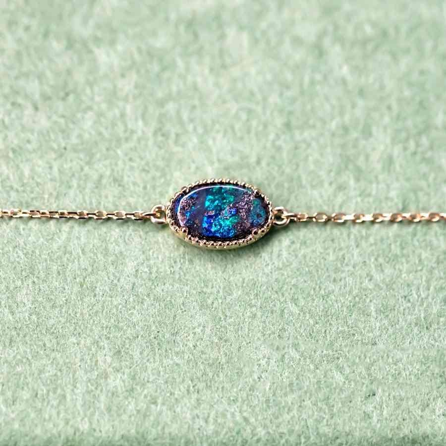 Oval Shaped Australian Boulder Opal Bracelet in 18K Yellow Gold.


Free Domestic USPS First Class Shipping! Free Gift Bag or Box with every order!

Opal—the queen of gemstones, is one of the most beautiful gemstones in the world. Every piece of opal