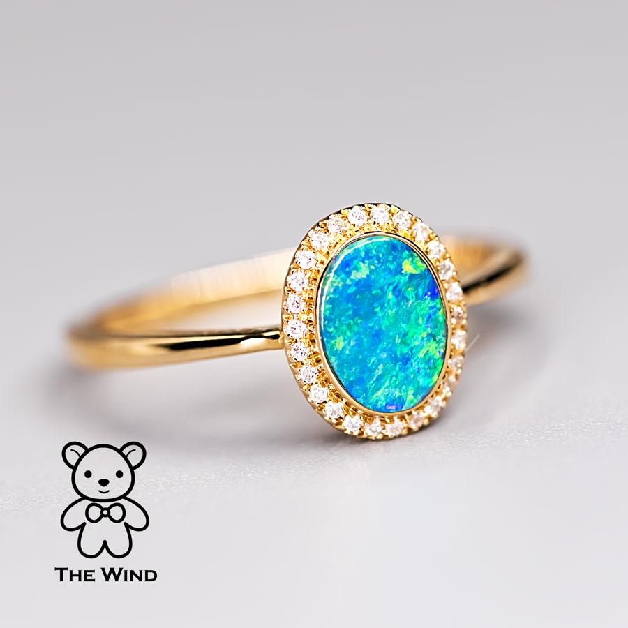 Oval Shaped Australian Doublet Opal Halo Diamond Ring 14k Yellow Gold.


Free Domestic USPS First Class Shipping! Free Gift Bag or Box with every order!

Opal—the queen of gemstones, is one of the most beautiful gemstones in the world. Every piece