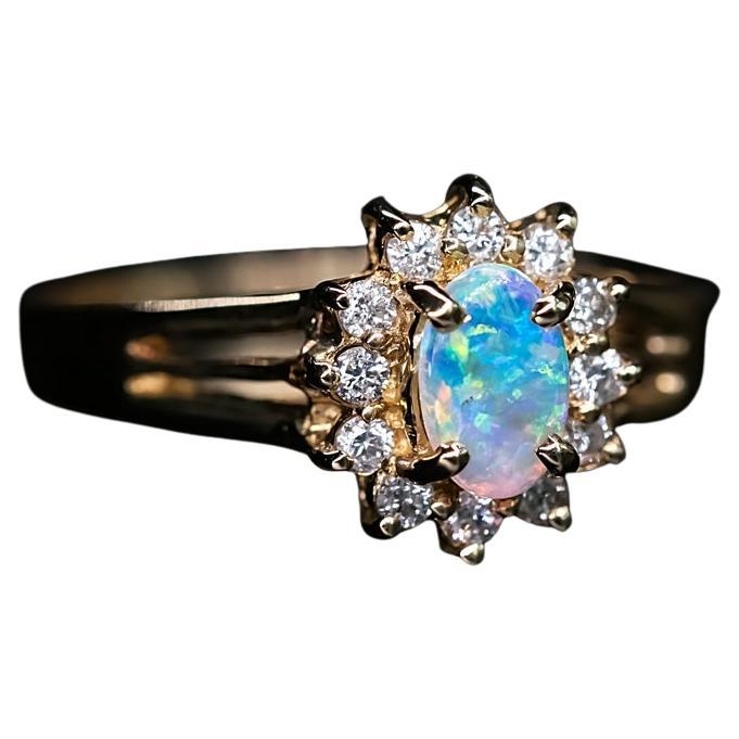 Oval Shaped Australian Solid Opal Diamond Engagement Ring 14K Yellow Gold


Free Domestic USPS First Class Shipping!  Free One Year Limited Warranty!  Free Gift Bag or Box with every order!



Opal—the queen of gemstones, is one of the most