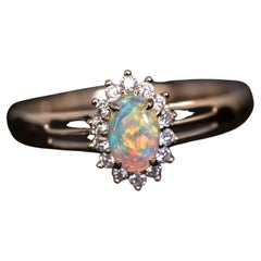 Oval Shaped Australian Solid Opal Diamond Engagement Ring 14K Yellow Gold
