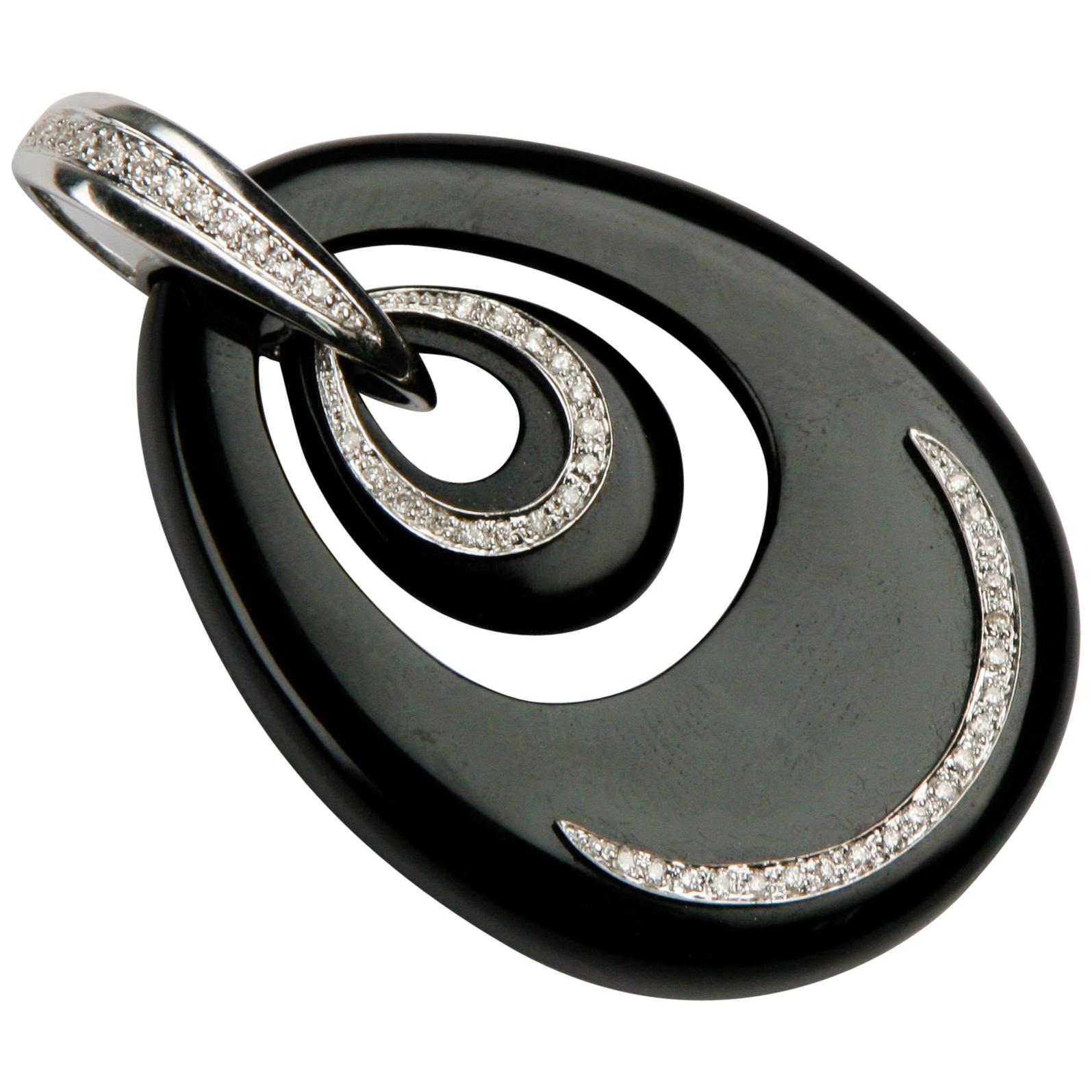 Oval Shaped Black Onyx and Diamond Pendant Set in 18 Karat White Gold For Sale