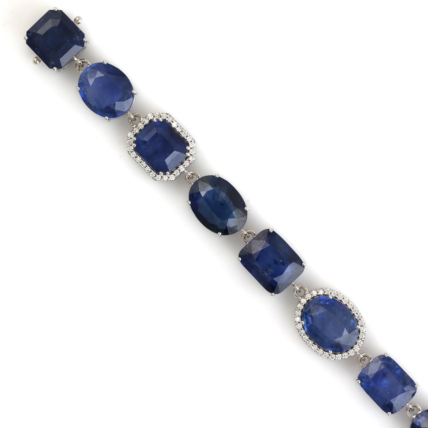 18KT:20.667g,D:0.86ct, Sapp:67.07ct, 