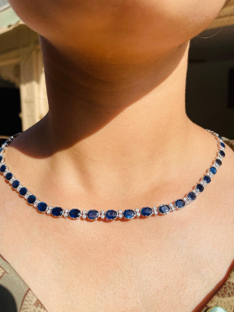 Blue Sapphire Necklace in 18K Gold studded with oval cut sapphire pieces and diamonds.
Accessorize your look with this elegant blue sapphire beaded necklace. This stunning piece of jewelry instantly elevates a casual look or dressy outfit.