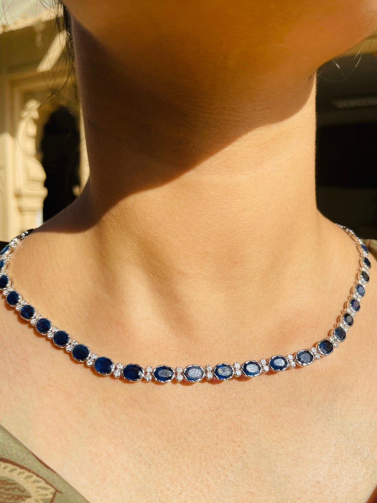 Women's Oval Shaped Blue Sapphire Necklace in 18K White Gold with Diamonds For Sale