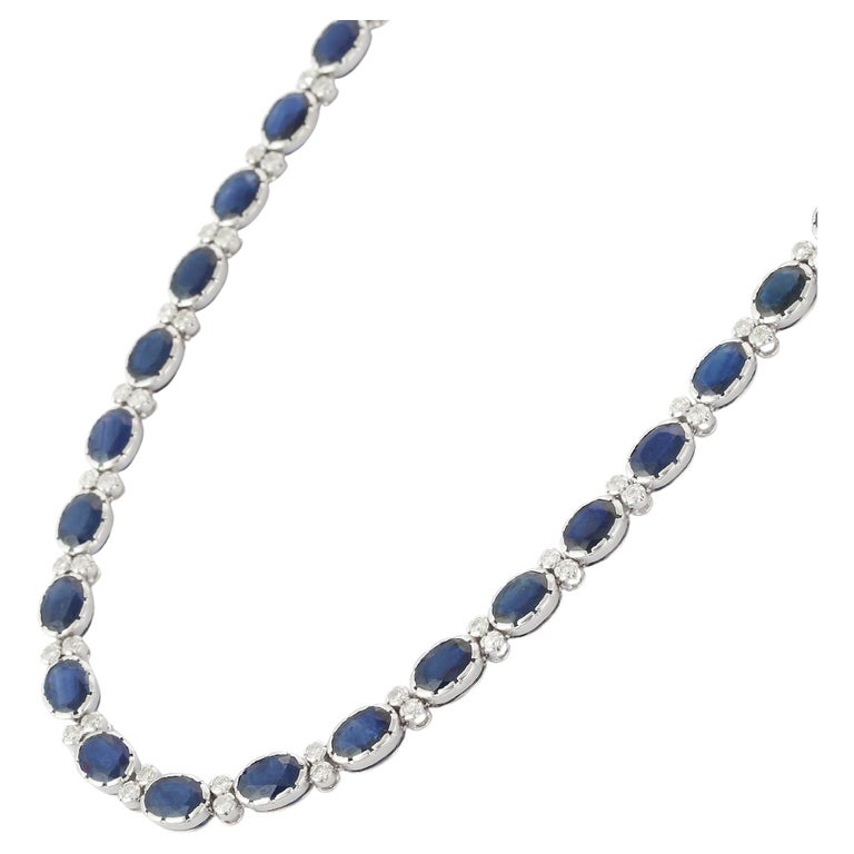 Oval Shaped Blue Sapphire Necklace in 18K White Gold with Diamonds For Sale