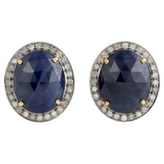 Boucles d'oreilles en saphir bleu de forme ovale avec diamants en or jaune 18k et argent