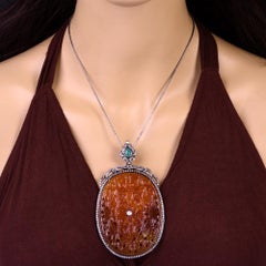 Oval Shaped Carved Agate Pendant with Emerald & Diamonds in 18k Gold & Silver