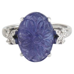 Ovaler geschnitzter Tansanit Ring mit Diamanten in 18k Weißgold