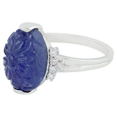 Oval Shaped Carved Tanzanite Ring WIth Diamonds Made In 18k White Gold