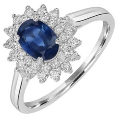 Bague en or blanc 18k avec saphir bleu de Ceylan de forme ovale et diamants