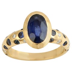 Oval Shaped Ceylon Blue Sapphire Band Ring With Diamonds Made In 18k Yellow Gold