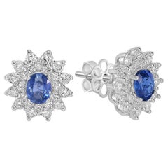 Borchie ovali con diamanti tempestate di zaffiro blu di Ceylon in oro 18 carati