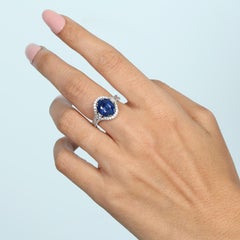 Oval Shaped Ceylon Blue Sapphire Ring Accented With Diamonds Made In 18k Gold