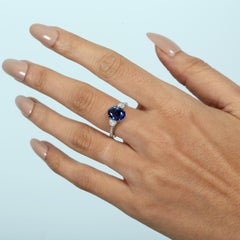 Oval Shaped Ceylon Blue Sapphire Ring Accented With Diamonds Made In 18k Gold