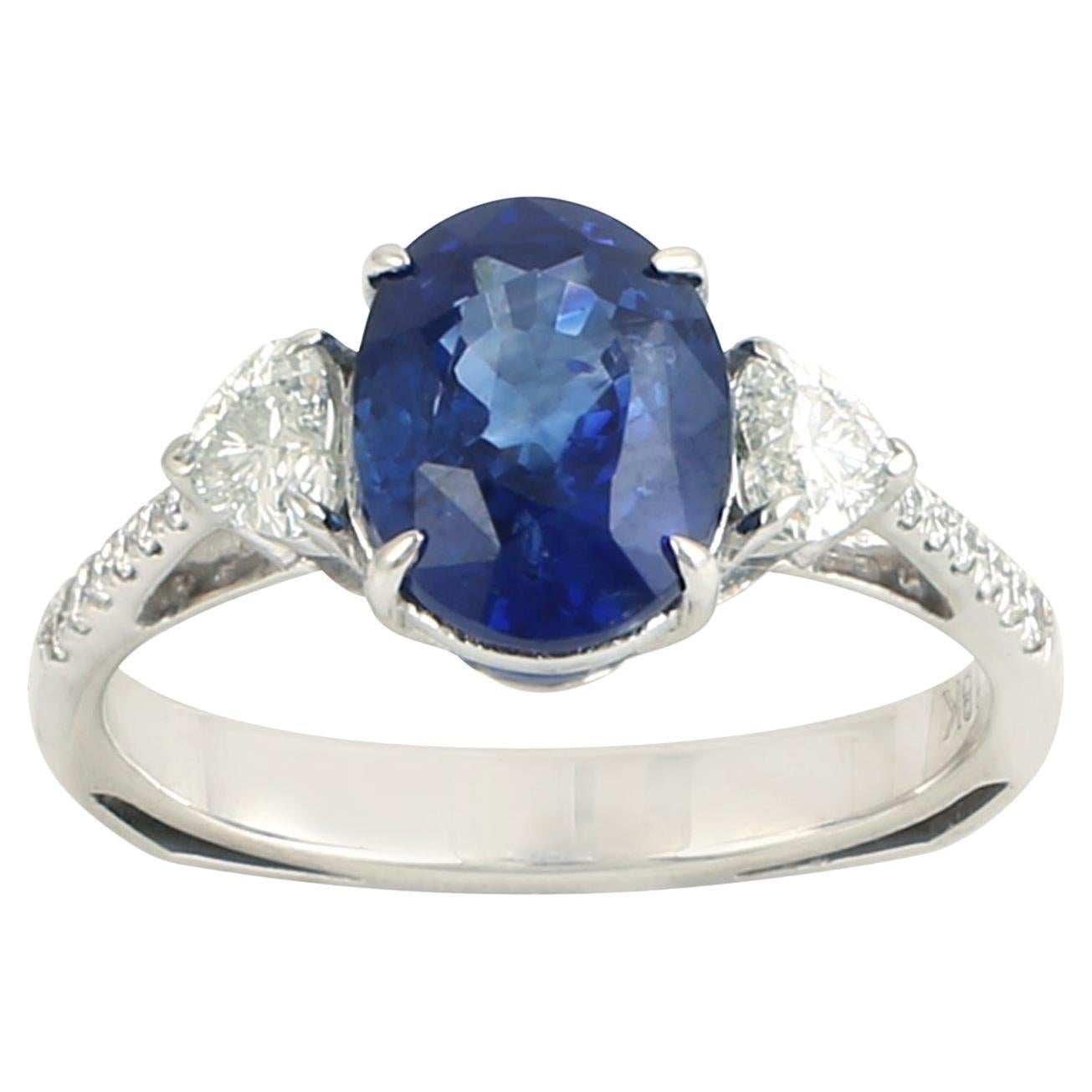 Oval Shaped Ceylon Blue Sapphire Ring Accented With Diamonds Made In 18k Gold