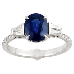 Oval Shaped Ceylon Blue Sapphire Ring Accented With Diamonds Made In 18k Gold