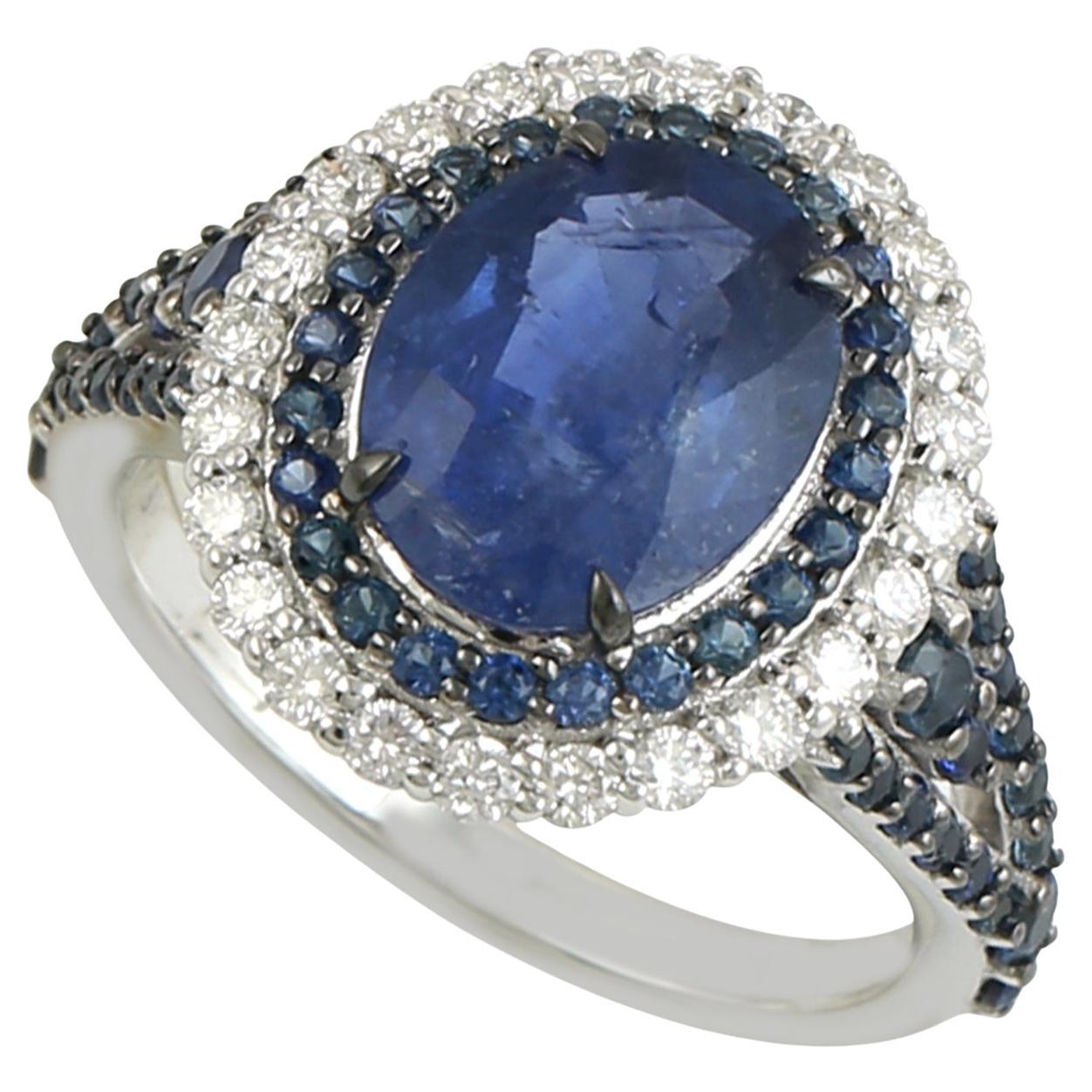 Oval Shaped Ceylon Blue Sapphire Ring Accented With Diamonds Made In 18k Gold