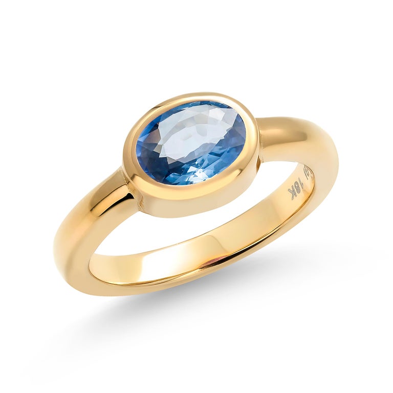 Oval Cut Oval Shaped Ceylon Sapphire Bezel Raised Dome Yellow Gold Cocktail Ring For Sale