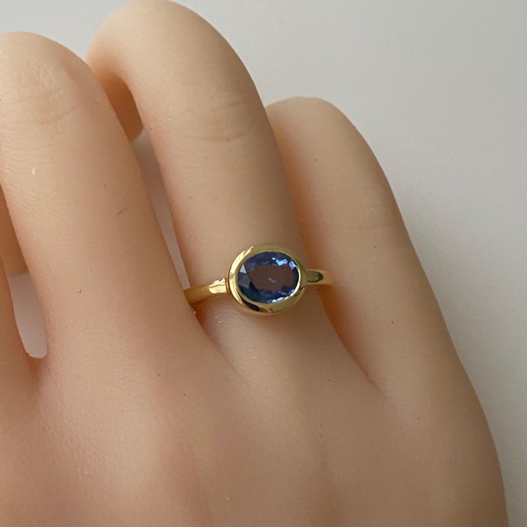 Oval Shaped Ceylon Sapphire Bezel Raised Dome Yellow Gold Cocktail Ring In New Condition For Sale In New York, NY