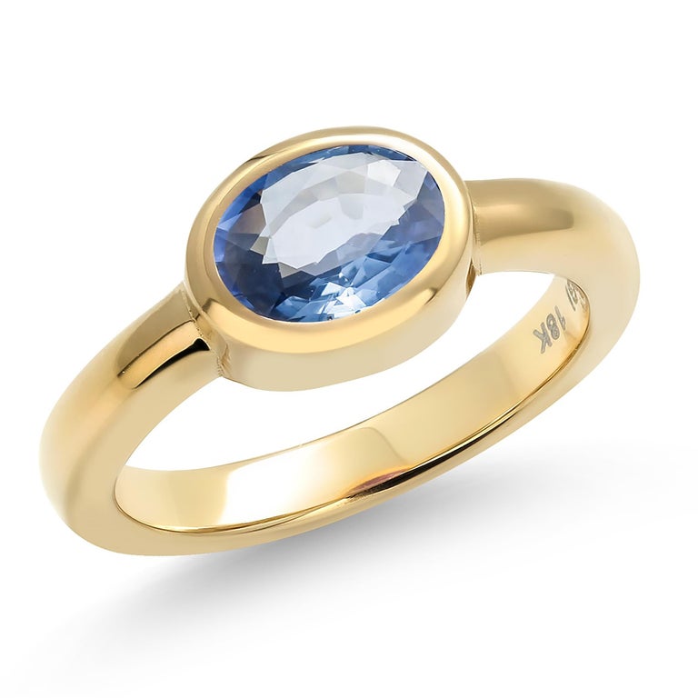 Women's Oval Shaped Ceylon Sapphire Bezel Raised Dome Yellow Gold Cocktail Ring For Sale