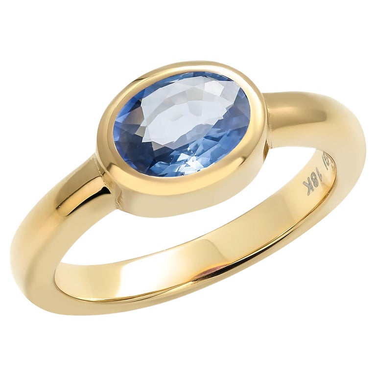 Oval Shaped Ceylon Sapphire Bezel Raised Dome Yellow Gold Cocktail Ring For Sale