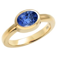 Ceylon Oval Sapphire 1.40 Carat Flush Set 18 Karat Yellow Gold Solitaire Ring 