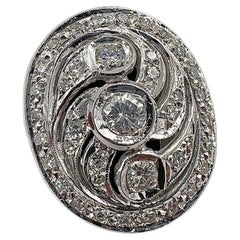 Anillo de oro blanco con diamante de cóctel de forma ovalada Circa 1960s