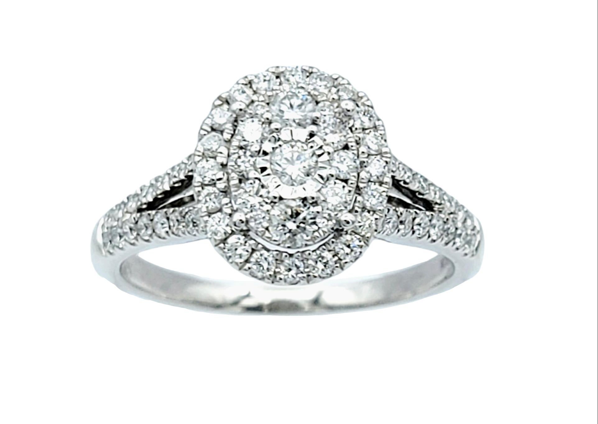 Ring size: 9.75

Introducing a dazzling double pave halo diamond engagement ring in lustrous white gold. This exquisite piece of jewelry exudes romance and luxury, making it the perfect symbol of your everlasting love.

At its heart lies a petite