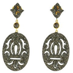 Boucles d'oreilles de forme ovale avec diamants noirs pavés en or et argent 18 carats