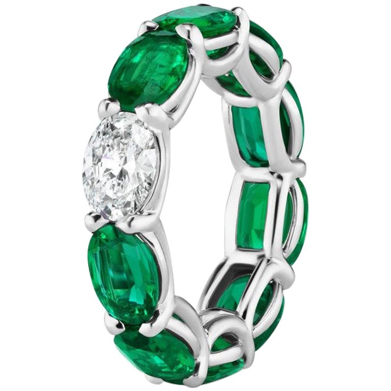 Oval Shaped Emerald and Diamond Horizontally East West Eternity Band Ring For Sale