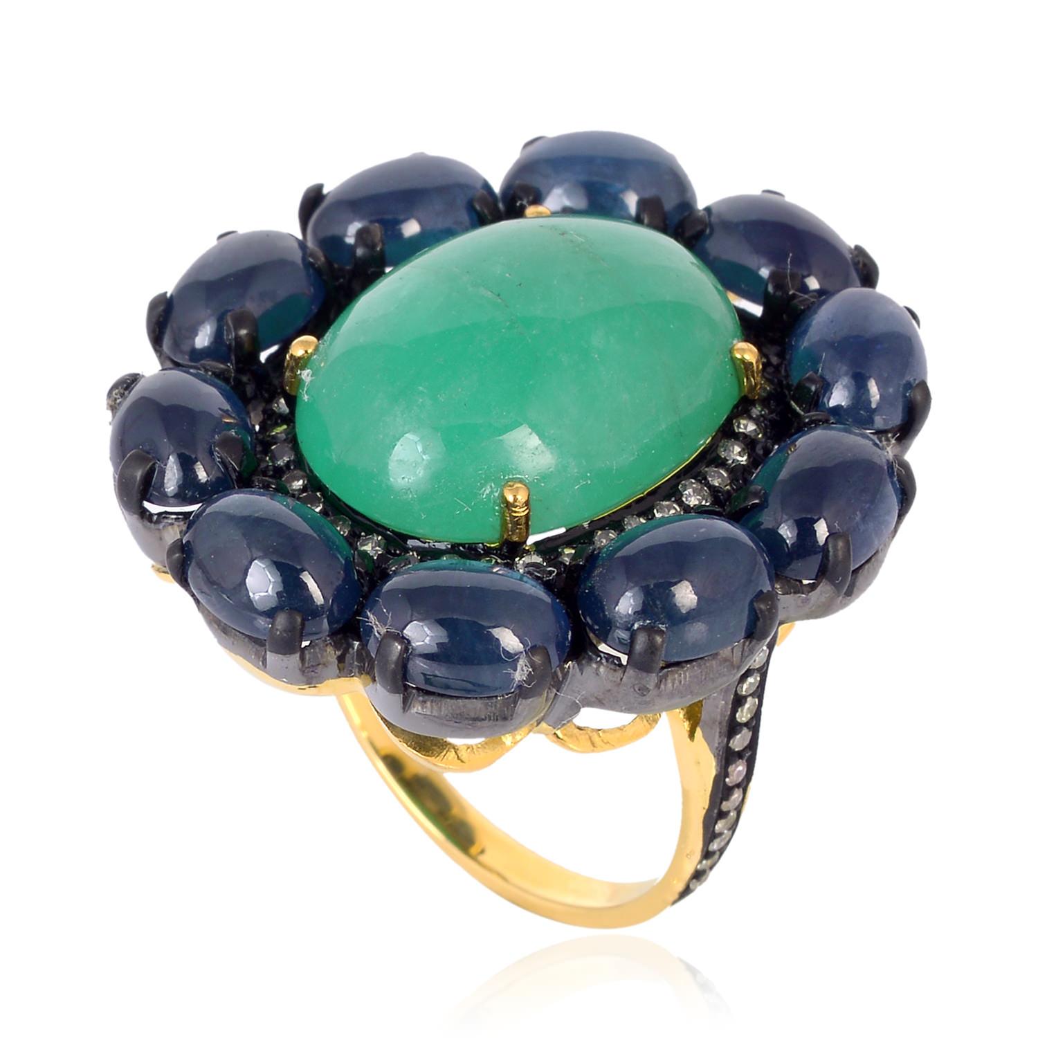 Women's Oval Shaped Emerald Cocktail Ring Accented With Blue Sapphire & Diamonds For Sale