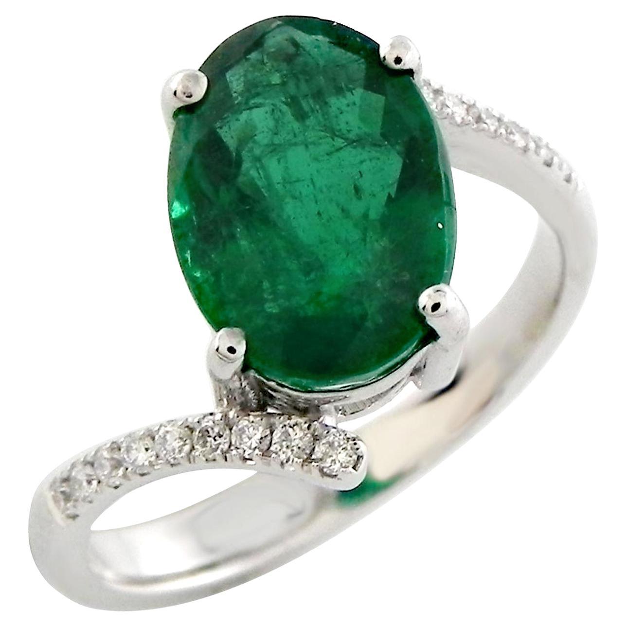 Oval Shaped Emerald Ring With Diamonds Made In 18k Gold For Sale