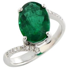 Oval Shaped Emerald Ring With Diamonds Made In 18k Gold