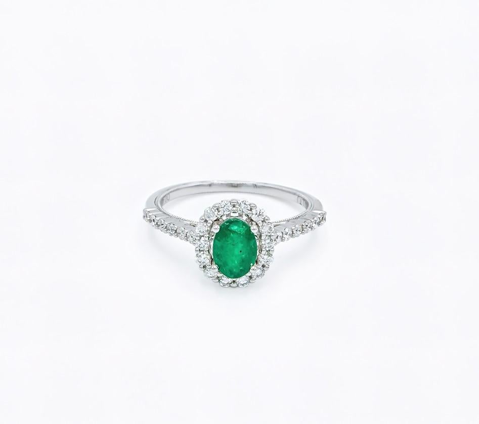 Oval Cut Oval Shaped Emerald with Diamond Halo and Simple Diamond Band Engagement Ring For Sale