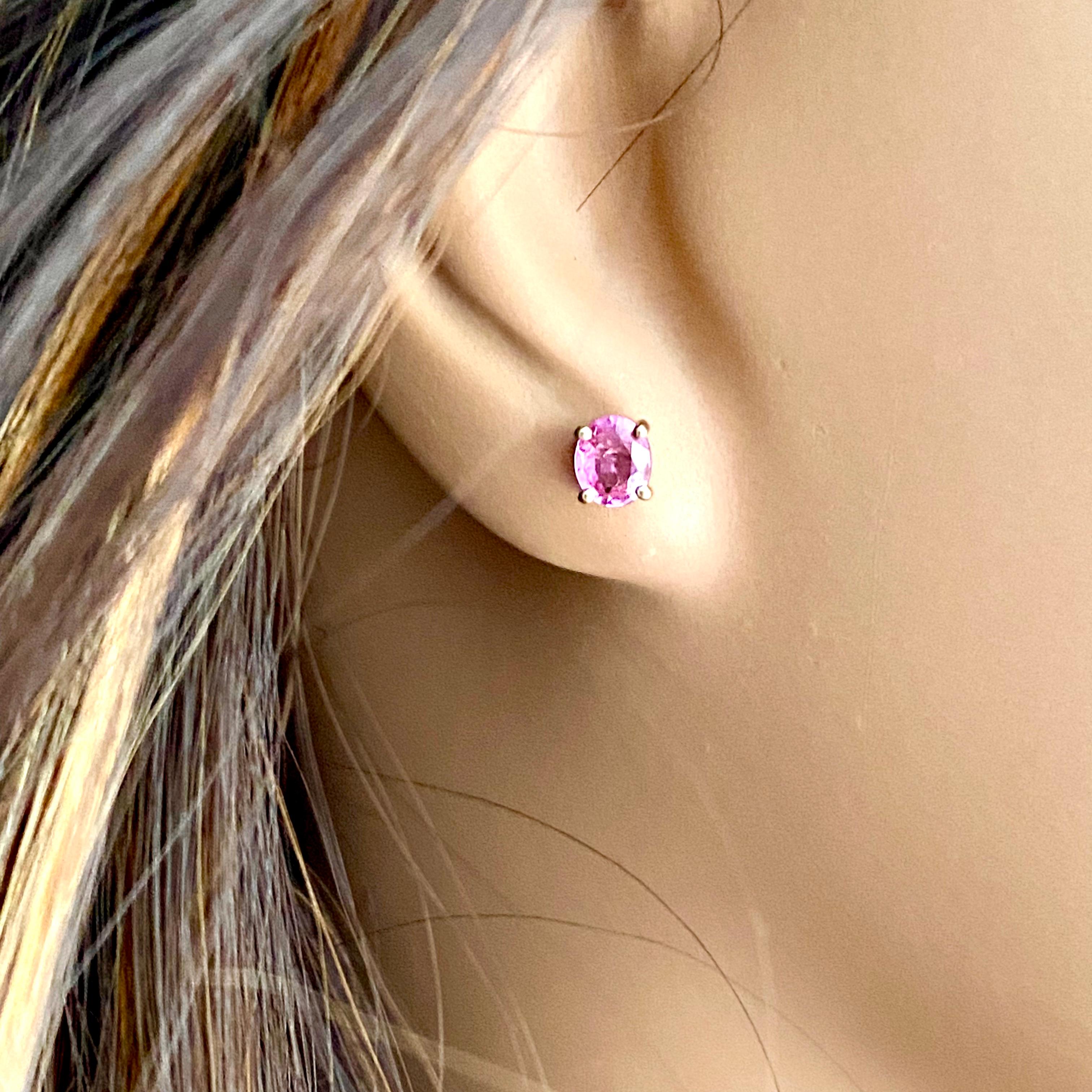 Contemporary Oval Shaped Mini Ceylon Pink Sapphires Set in Yellow Gold Stud Earrings For Sale
