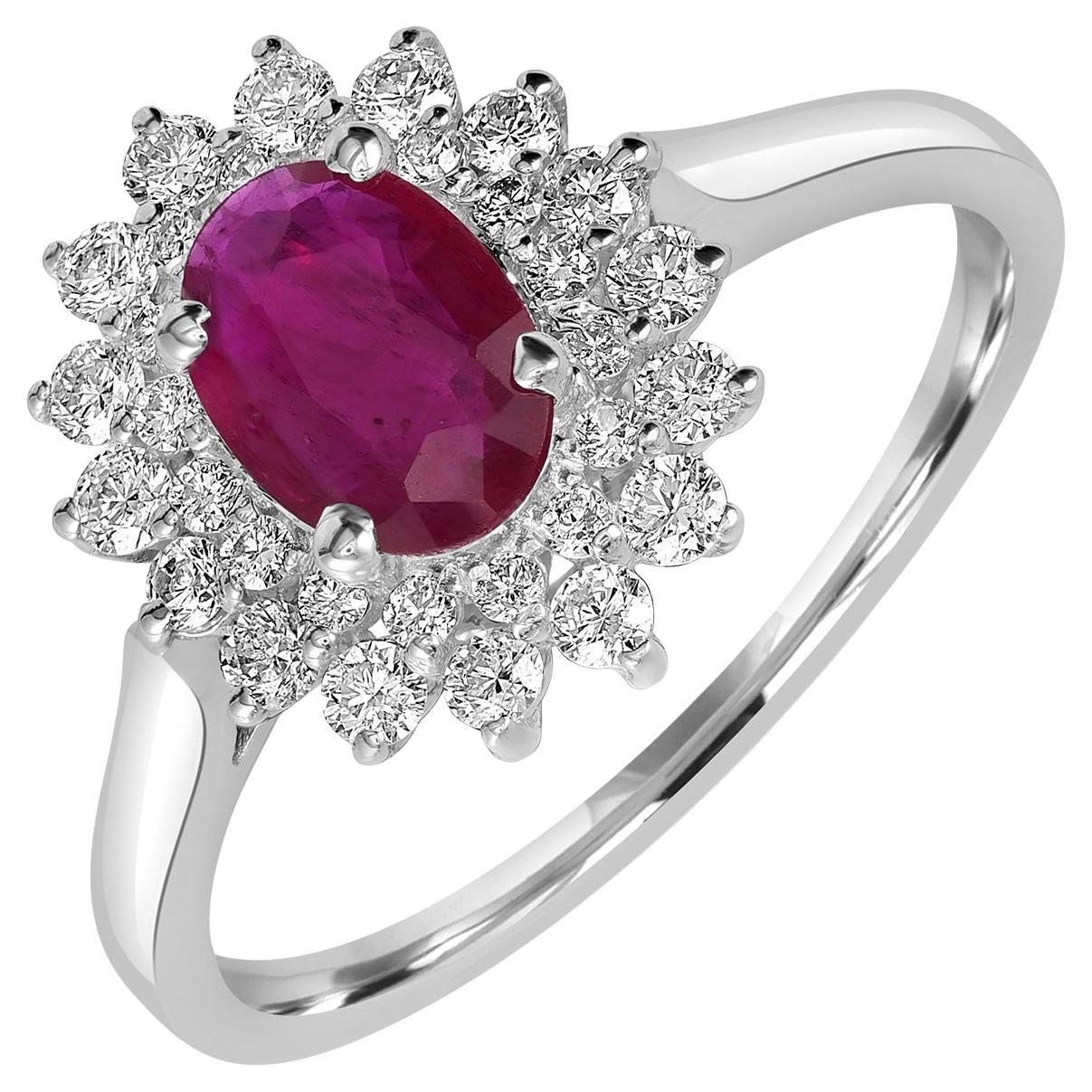 Oval Shaped Mozambique Ruby Snow Flake Ring With Diamonds Made in 18k White Gold For Sale