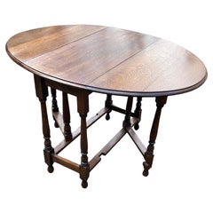 Vintage Oval shaped Oak Gate Leg dining table