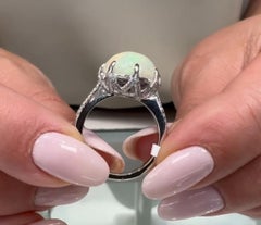 5.43 Carat Oval Opal Ring Prong Set in 14K White Gold with High Polish Finish