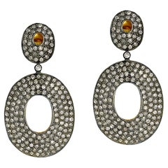 Orecchini pendenti con diamanti ovali a forma di pavé in oro 14k e argento