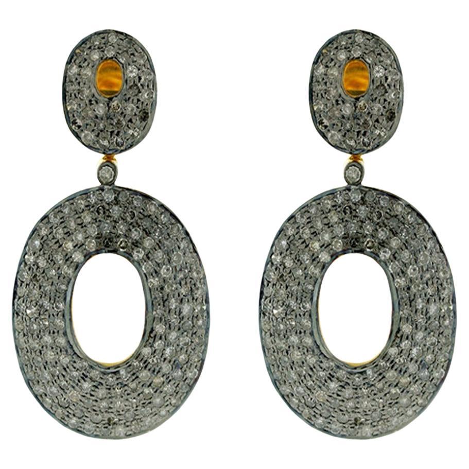 Boucles d'oreilles pendantes en or et argent 14k avec diamants pavés de forme ovale