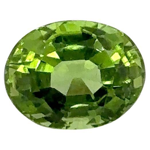 
This vibrant 4.85-carat oval-shaped Peridot, sourced from Myanmar, glows with a lush green hue, untouched by heat treatments, preserving its natural brilliance. 

Known as the 