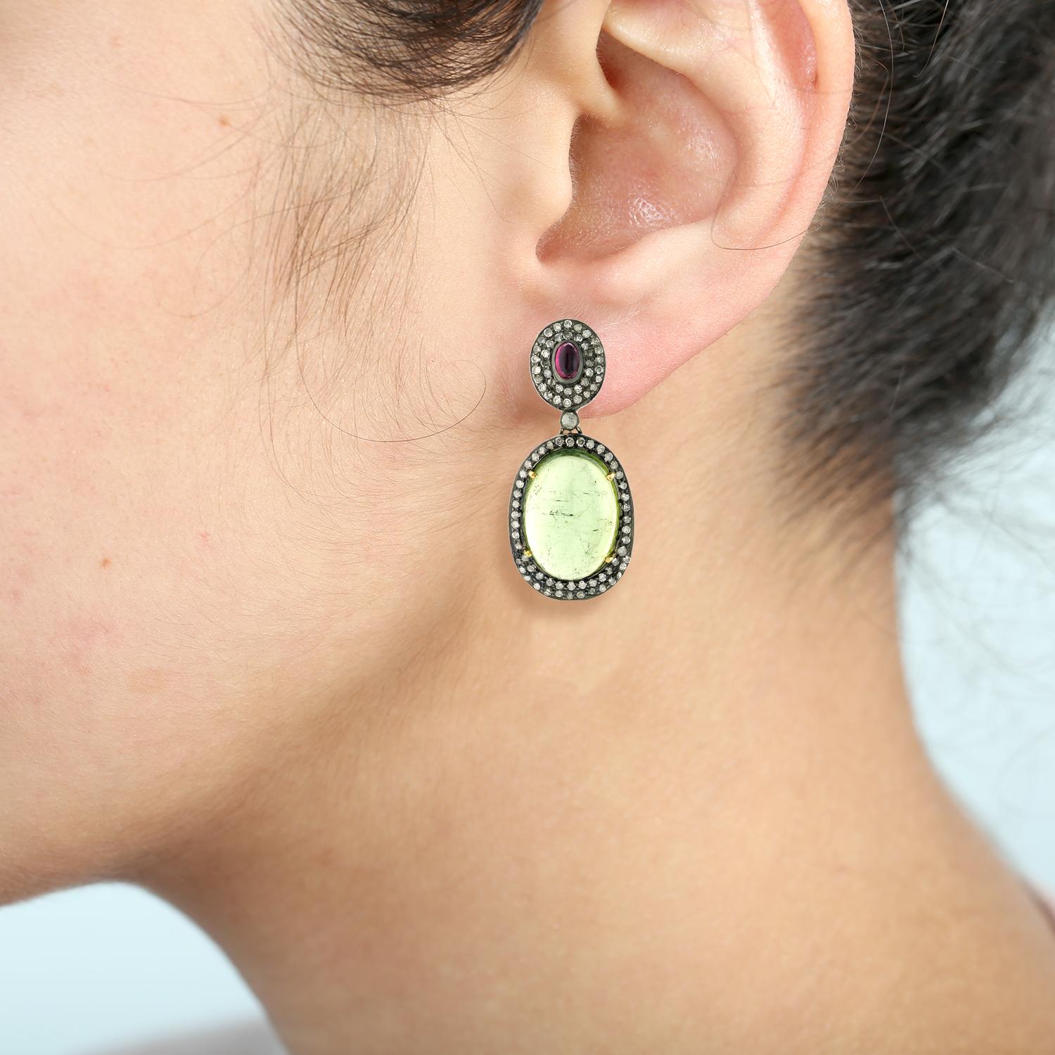 Make a statement with this stunning Oval Pink & Green Tourmaline with Pave Diamonds, handcrafted in 18k Gold & Silver. The perfect blend of elegance and sophistication, this piece is sure to turn heads and become a cherished addition to any jewelry