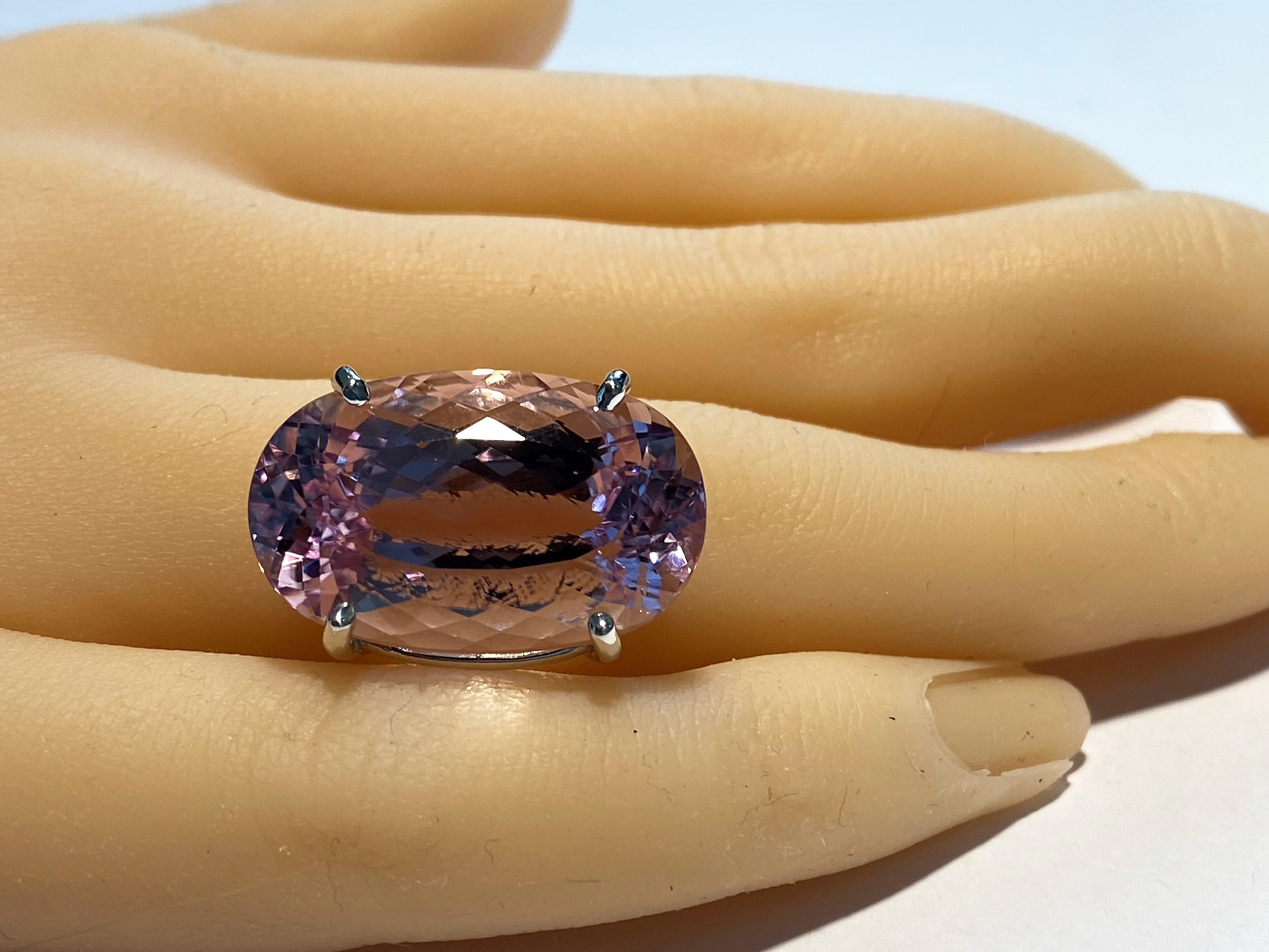 Modern Oval Shaped Pink Kunzite Weighing 28.61 Carats White Gold Cocktail Ring